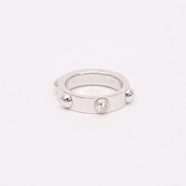 Bague "Clous" et diamant.-0